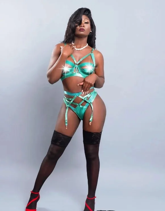 Ts Sasha Blue (@tssashablue1) Black Girl onlyfans model picture standing wearing green lingerie